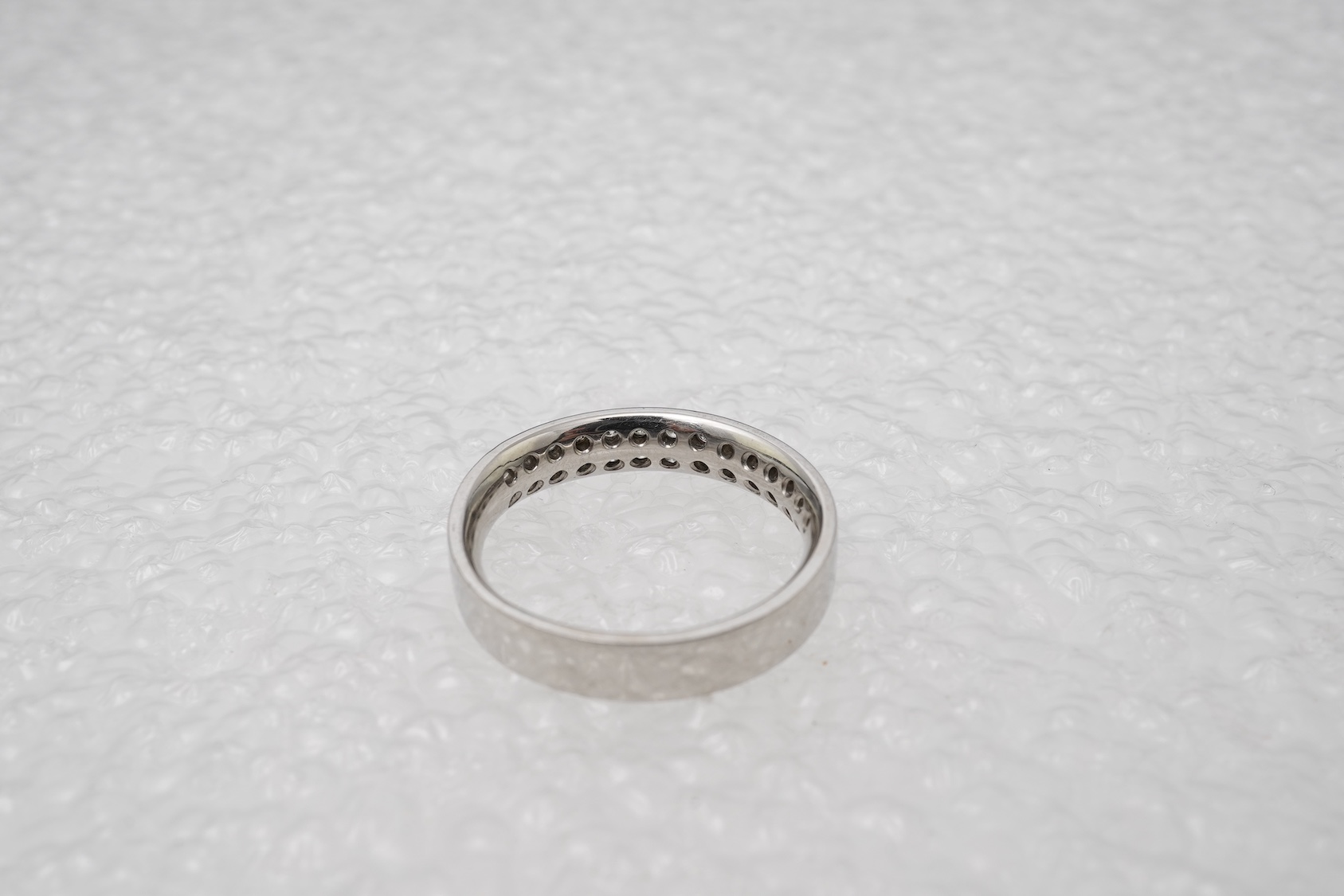 A diamond half eternity ring